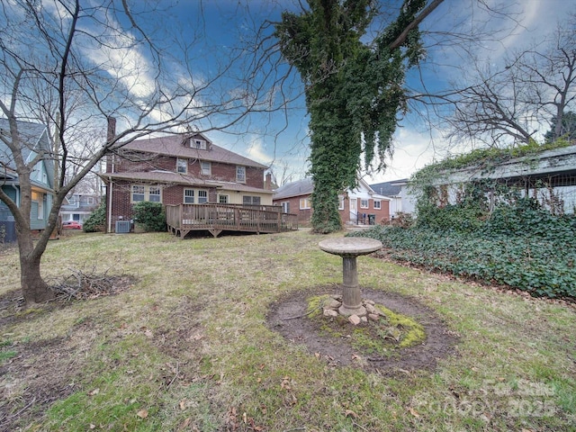 113 2nd St, Spencer, NC 28159 - view of grassy yard featuring a wooden deck and central air condition unit