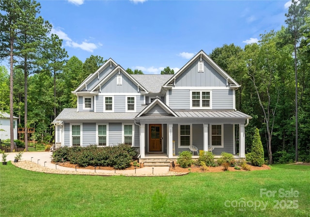 view of front of house with a front lawn and covered porch