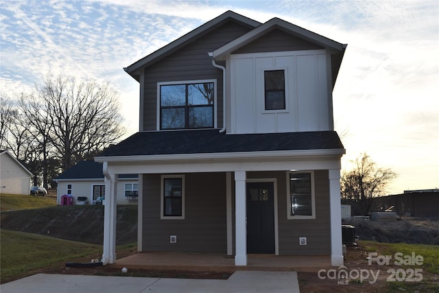 view of front of home featuring central AC and covered porch