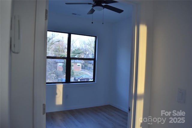 unfurnished room featuring ceiling fan and light hardwood / wood-style flooring