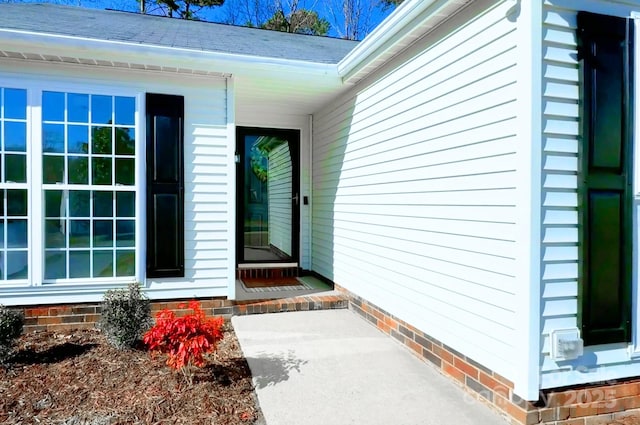 view of exterior entry featuring crawl space