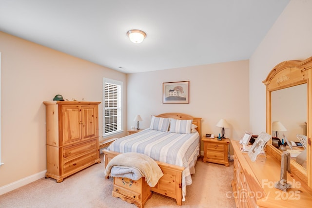 bedroom with light carpet