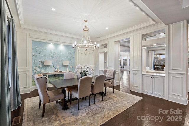 dining room with crown molding, a chandelier, and dark hardwood / wood-style flooring