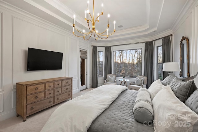 bedroom featuring light carpet, a tray ceiling, multiple windows, and crown molding