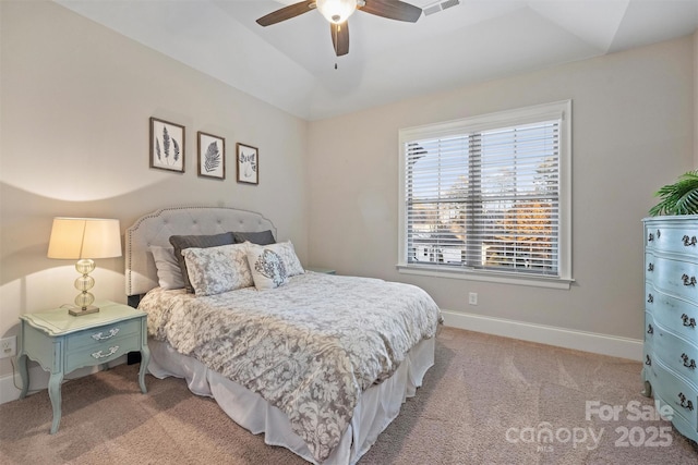 carpeted bedroom featuring vaulted ceiling and ceiling fan