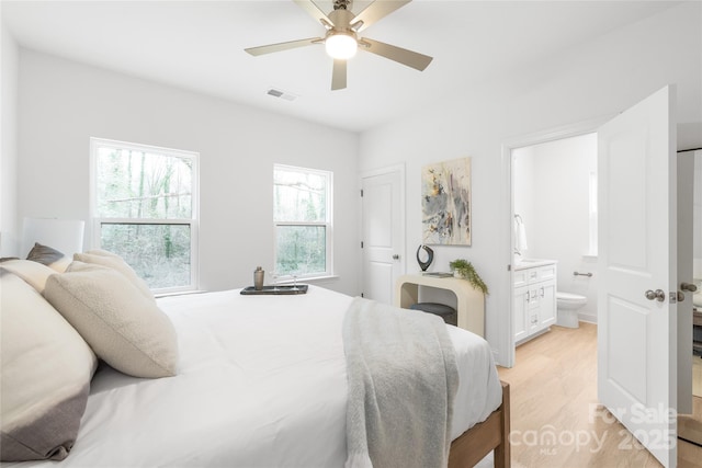 2811 New Pineola Rd, Charlotte, NC 28208 - bedroom featuring ensuite bathroom, ceiling fan, and light hardwood / wood-style floors