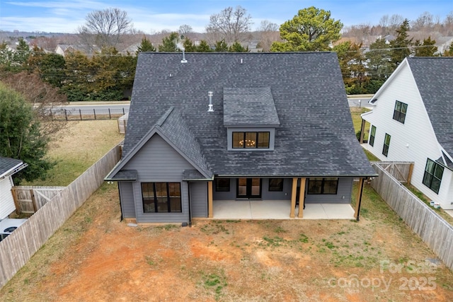 rear view of house with a patio area