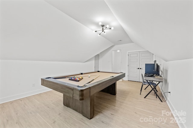 game room featuring light wood-type flooring, lofted ceiling, and pool table