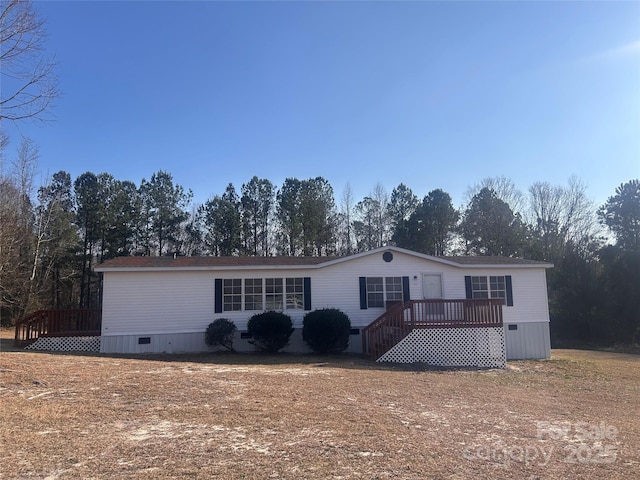 view of front of house featuring a deck