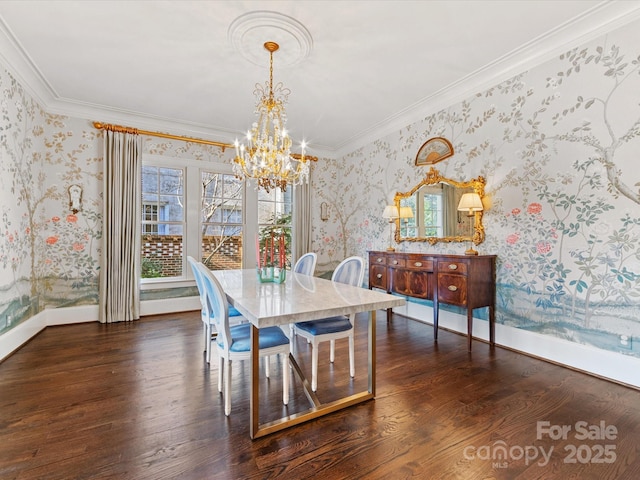 dining room featuring crown molding, wallpapered walls, and an inviting chandelier