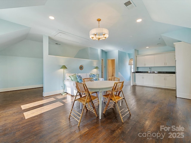 dining room featuring recessed lighting, baseboards, vaulted ceiling, visible vents, and dark wood-style floors