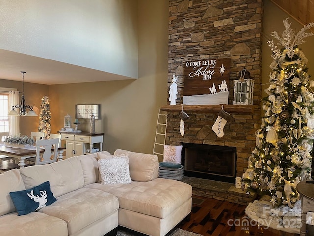 living room with hardwood / wood-style floors and a fireplace