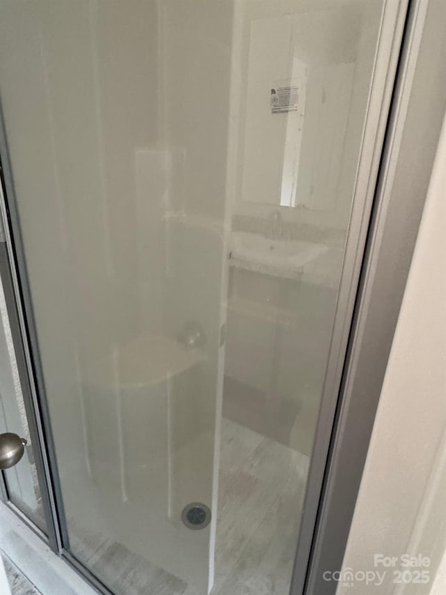 bathroom with a stall shower