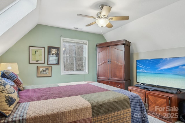 bedroom with ceiling fan and lofted ceiling