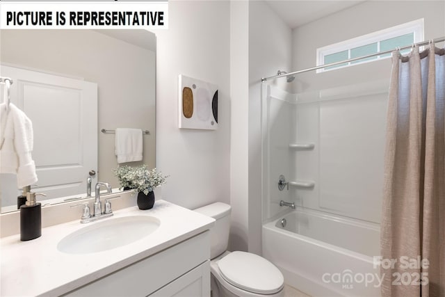 full bathroom featuring shower / tub combo, vanity, and toilet