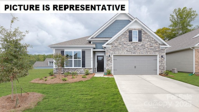 craftsman inspired home with a garage and a front yard