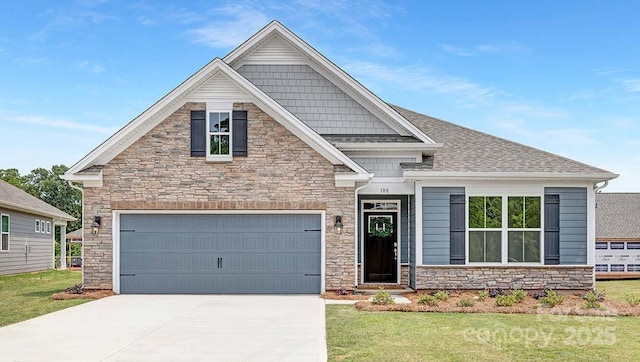 108 Sari St, Troutman, NC 28166 - craftsman house featuring stone siding, concrete driveway, a front lawn, and a shingled roof
