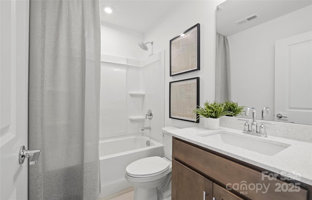 full bathroom featuring toilet, vanity, and shower / bathing tub combination