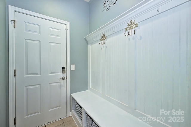 mudroom featuring light tile patterned flooring