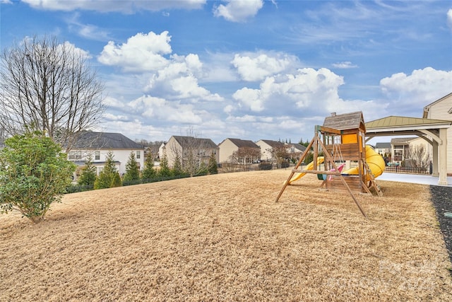 view of jungle gym featuring a residential view