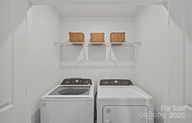 laundry room with washer and dryer