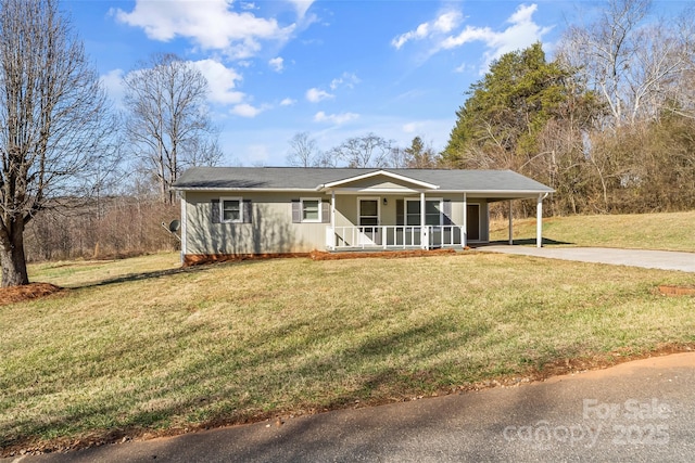 ranch-style house with a front lawn, a carport, and a porch