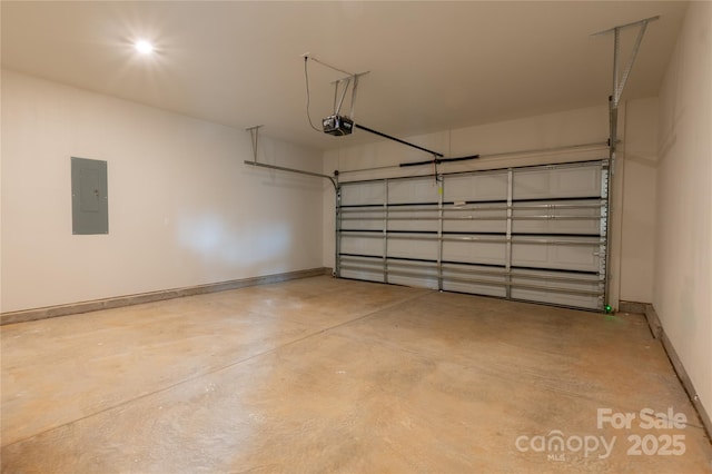 garage featuring a garage door opener and electric panel