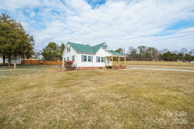 view of front of home with a front yard