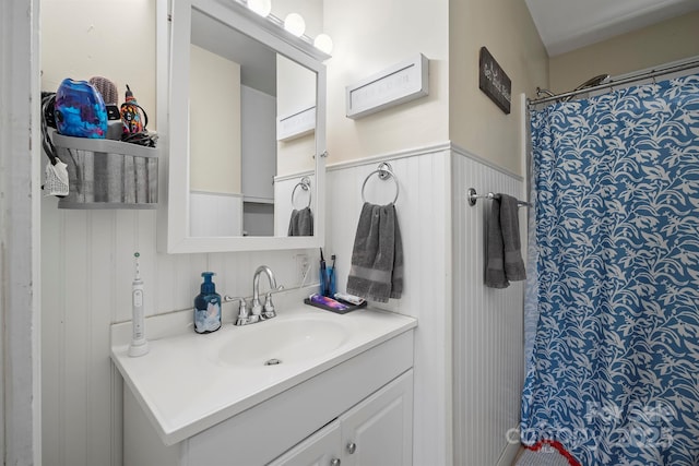 bathroom featuring vanity and walk in shower