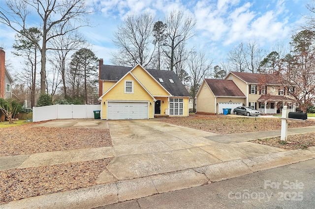 view of front of home with a garage