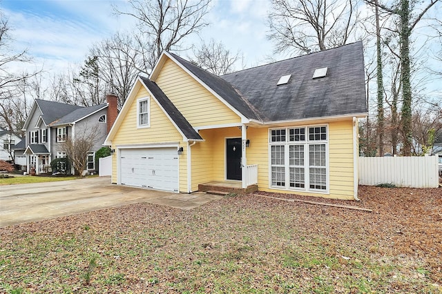 view of front of property with a garage