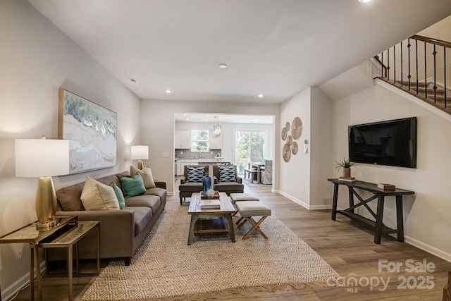 living room with light hardwood / wood-style floors