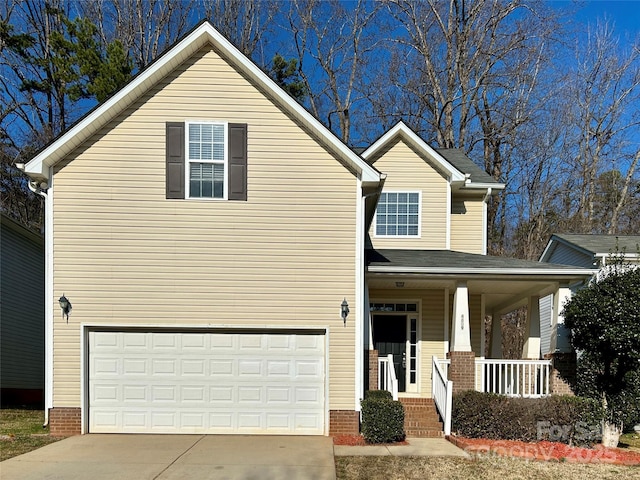 traditional-style house featuring an attached garage, covered porch, driveway, and a shingled roof