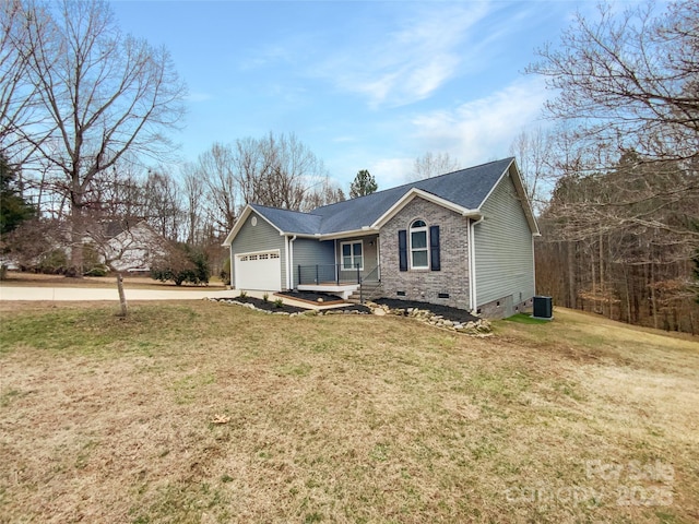 view of front facade featuring central AC unit, a garage, and a front yard