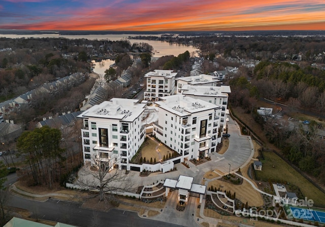 19329 Watermark Dr Unit 551/552, Cornelius, NC 28031 - aerial view at dusk featuring a water view