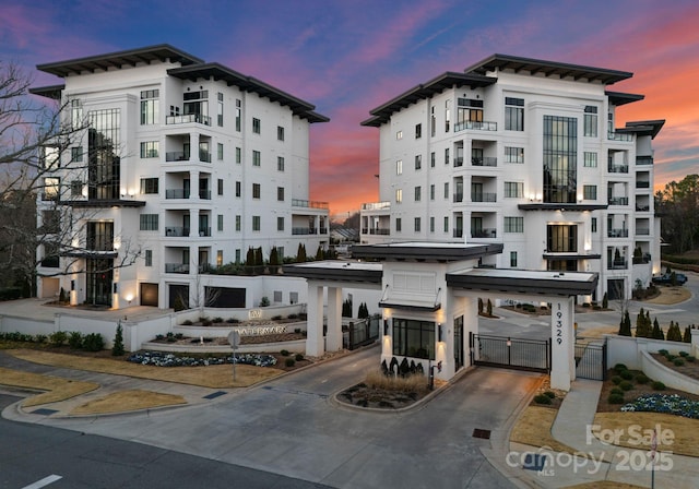 19329 Watermark Dr Unit 551/552, Cornelius, NC 28031 - view of outdoor building at dusk