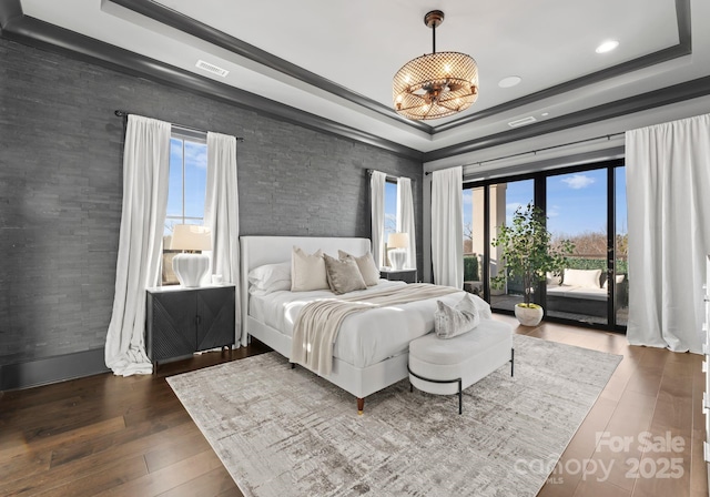 19329 Watermark Dr Unit 551/552, Cornelius, NC 28031 - bedroom with dark hardwood / wood-style floors, a raised ceiling, multiple windows, and access to outside