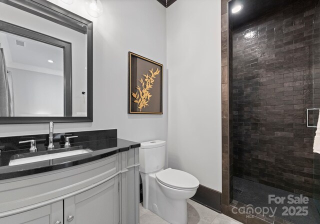 19329 Watermark Dr Unit 551/552, Cornelius, NC 28031 - bathroom featuring vanity, toilet, and a tile shower