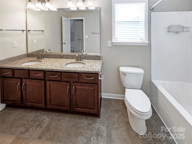 full bathroom featuring vanity, toilet, and shower / bathing tub combination