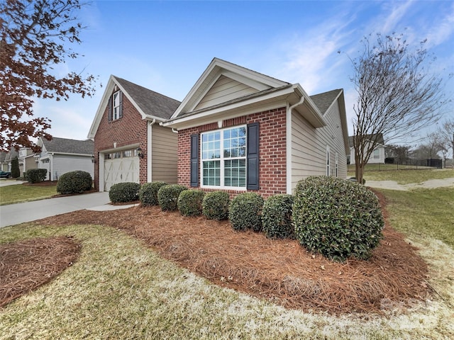 view of front of house with a garage and a front yard