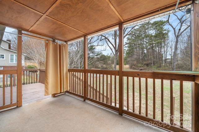 unfurnished sunroom featuring a healthy amount of sunlight