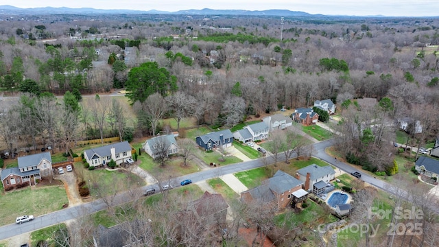 drone / aerial view featuring a mountain view