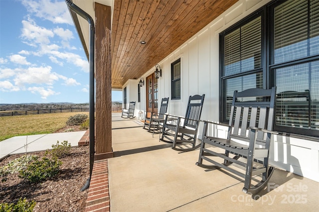 view of patio featuring a porch