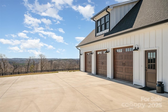 view of patio / terrace featuring a garage