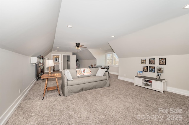 living room featuring lofted ceiling and carpet flooring