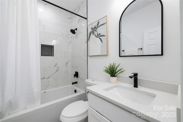 full bathroom featuring vanity, toilet, and shower / tub combo with curtain