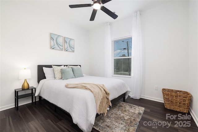 bedroom featuring ceiling fan and dark hardwood / wood-style flooring