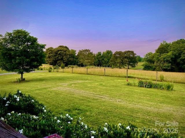 660 Scoggins Rd, Rutherfordton, NC 28139 - yard at dusk with view of scattered trees