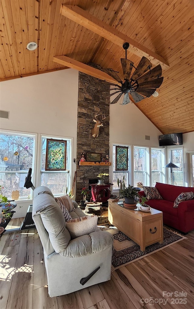 660 Scoggins Rd, Rutherfordton, NC 28139 - living area featuring a ceiling fan, a wooden ceiling with exposed beams, plenty of natural light, wood finished floors, and high vaulted ceiling