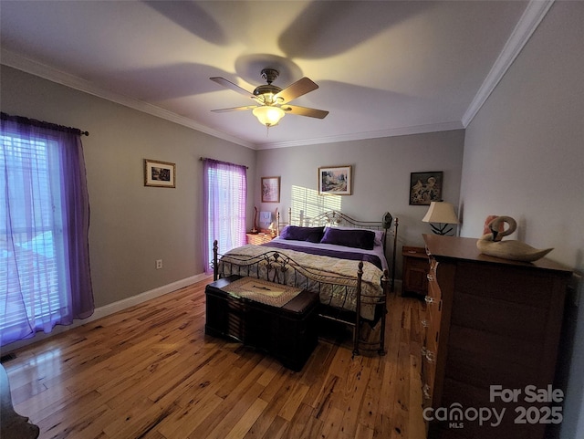 660 Scoggins Rd, Rutherfordton, NC 28139 - bedroom with light wood finished floors, ornamental molding, and ceiling fan